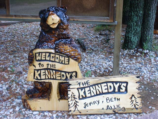 Bear Carving with Custom Sign
